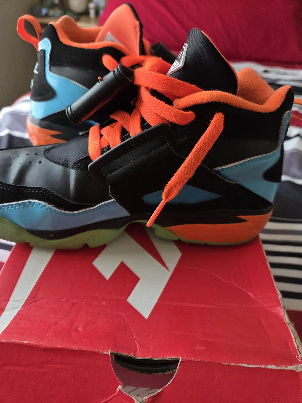 Nike Kids Black & Orange Athletic Shoes with Blue and Green Accents